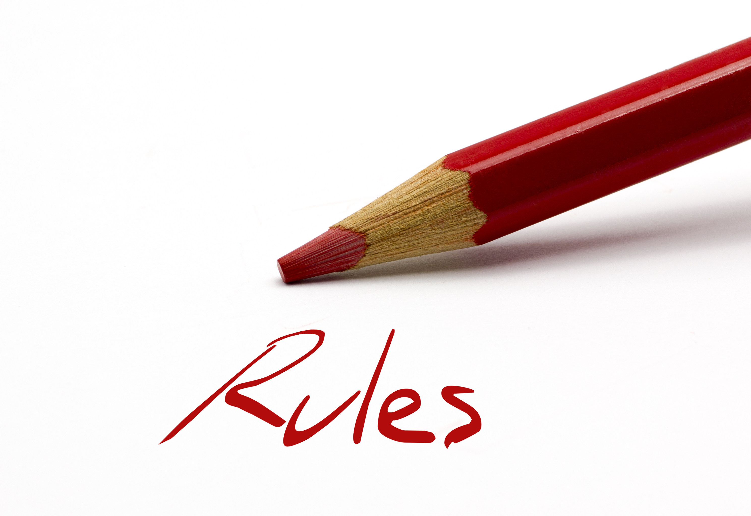 red pencil with the word "Rules"